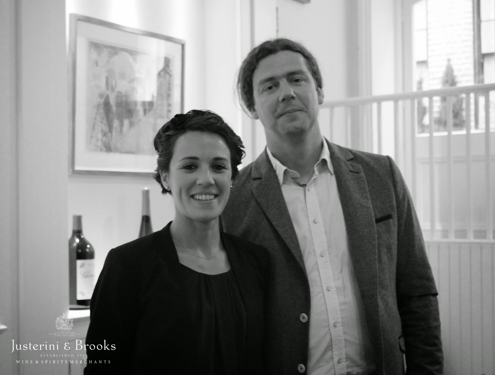black and white picture of two people smiling