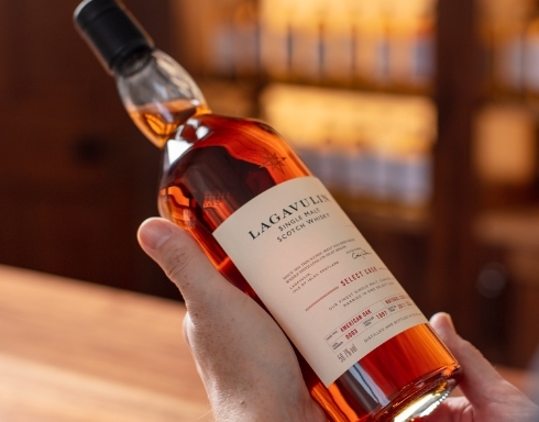 Man Holding Whisky Bottle