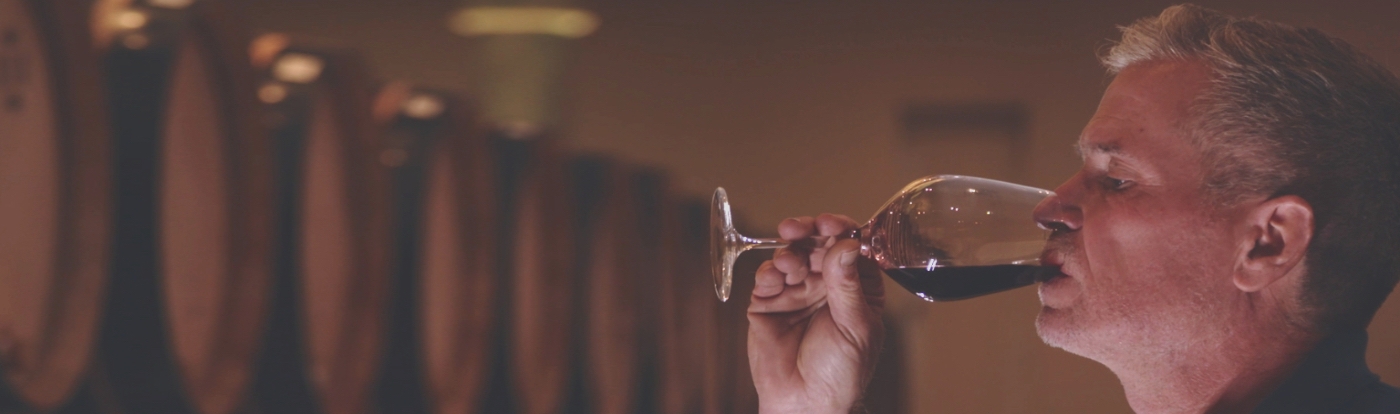 Man drinking red wine