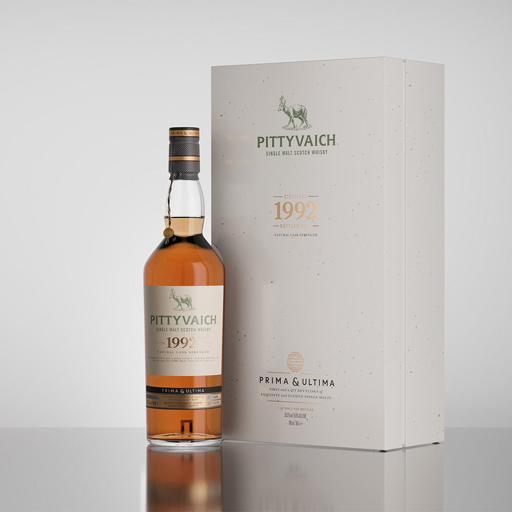 pittyvaich whisky bottle next to a white branded box