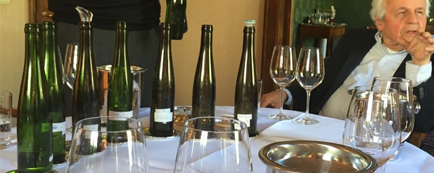 Manfred at the table with wine