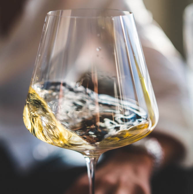 Close up of white glass of wine