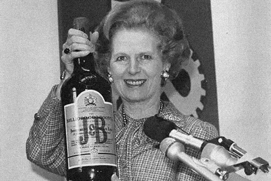 Margaret Thatcher holding billionth bottle