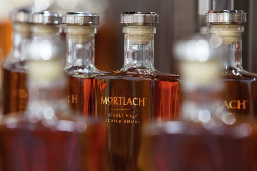close up image of whisky bottles