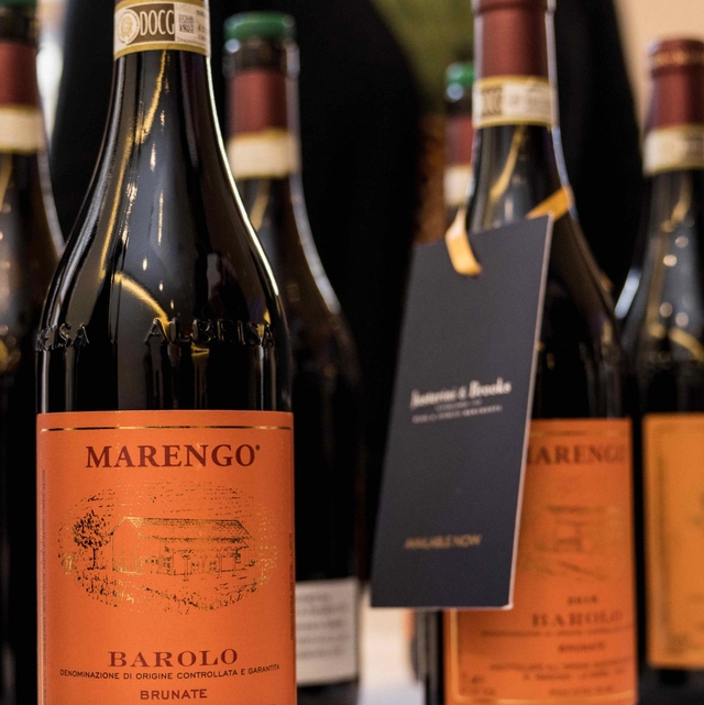 row of barbaresco wine bottles