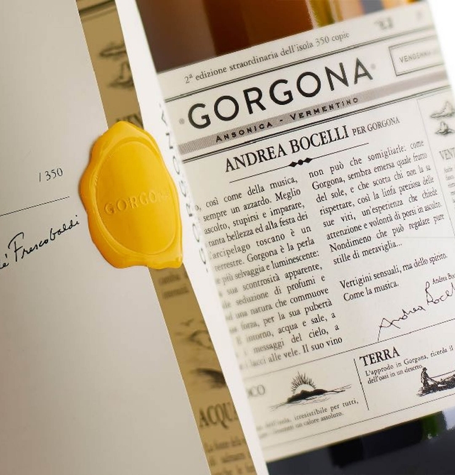 close up image of a wine bottle with white label that says Gorgona