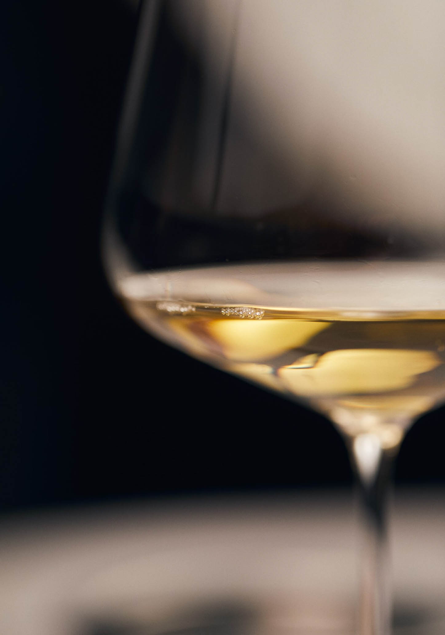 Close up shot of a white wine in a glass
