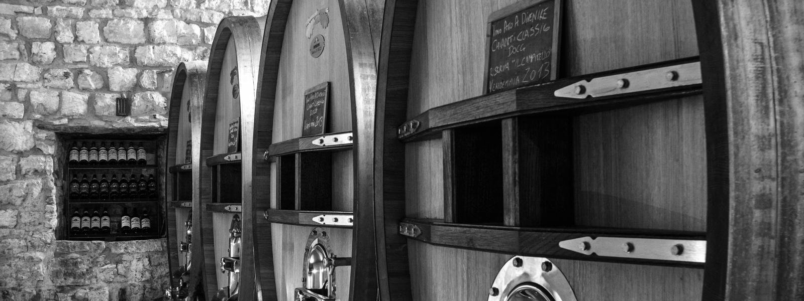 room of wine barrels and taps