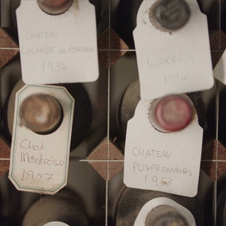 tops of bottles with labels