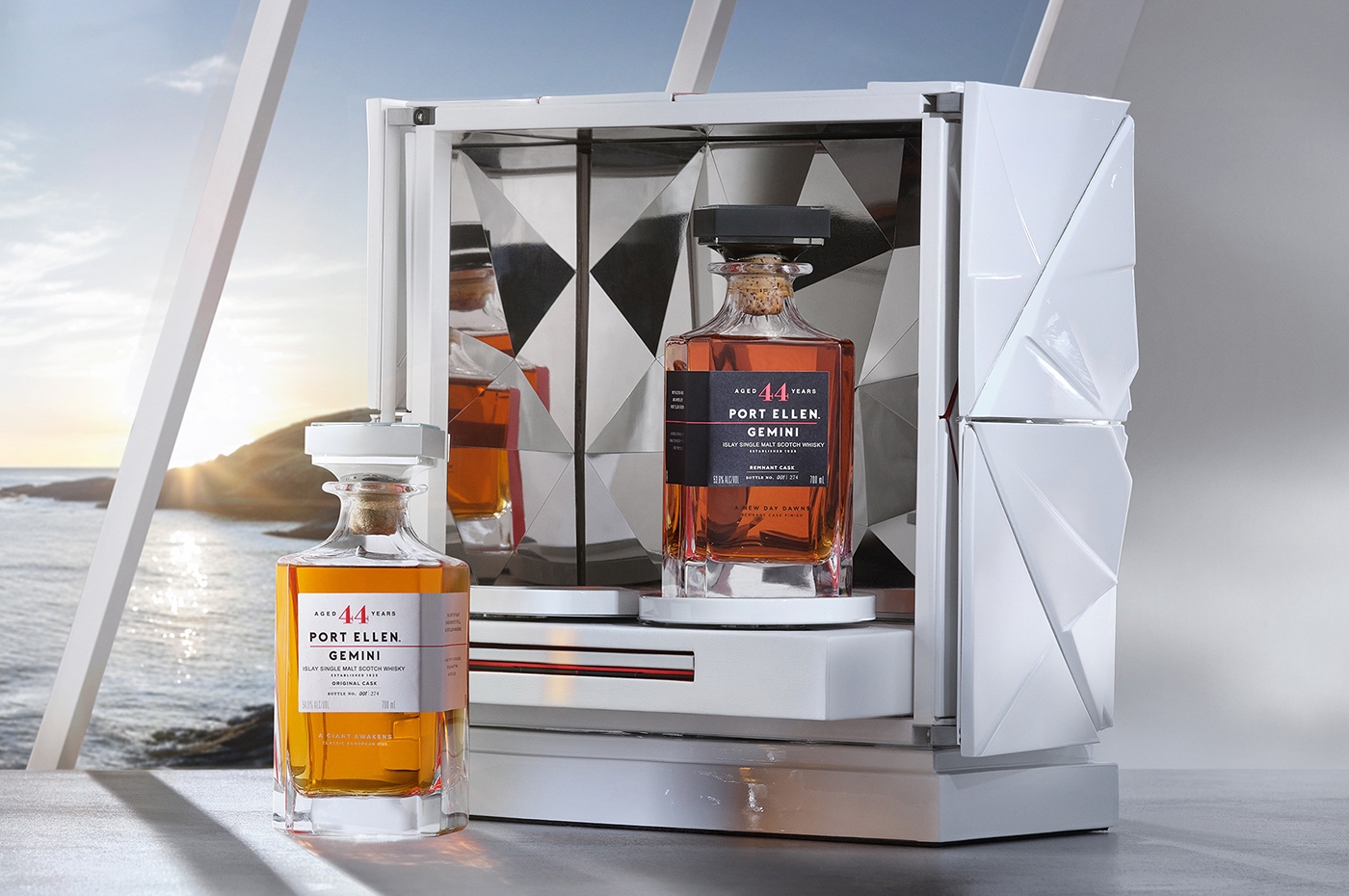 twin port ellen gemini whisky bottles in front of a white case and window with ocean view