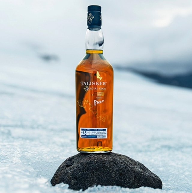 Talisker whisky bottle on a snowbank
